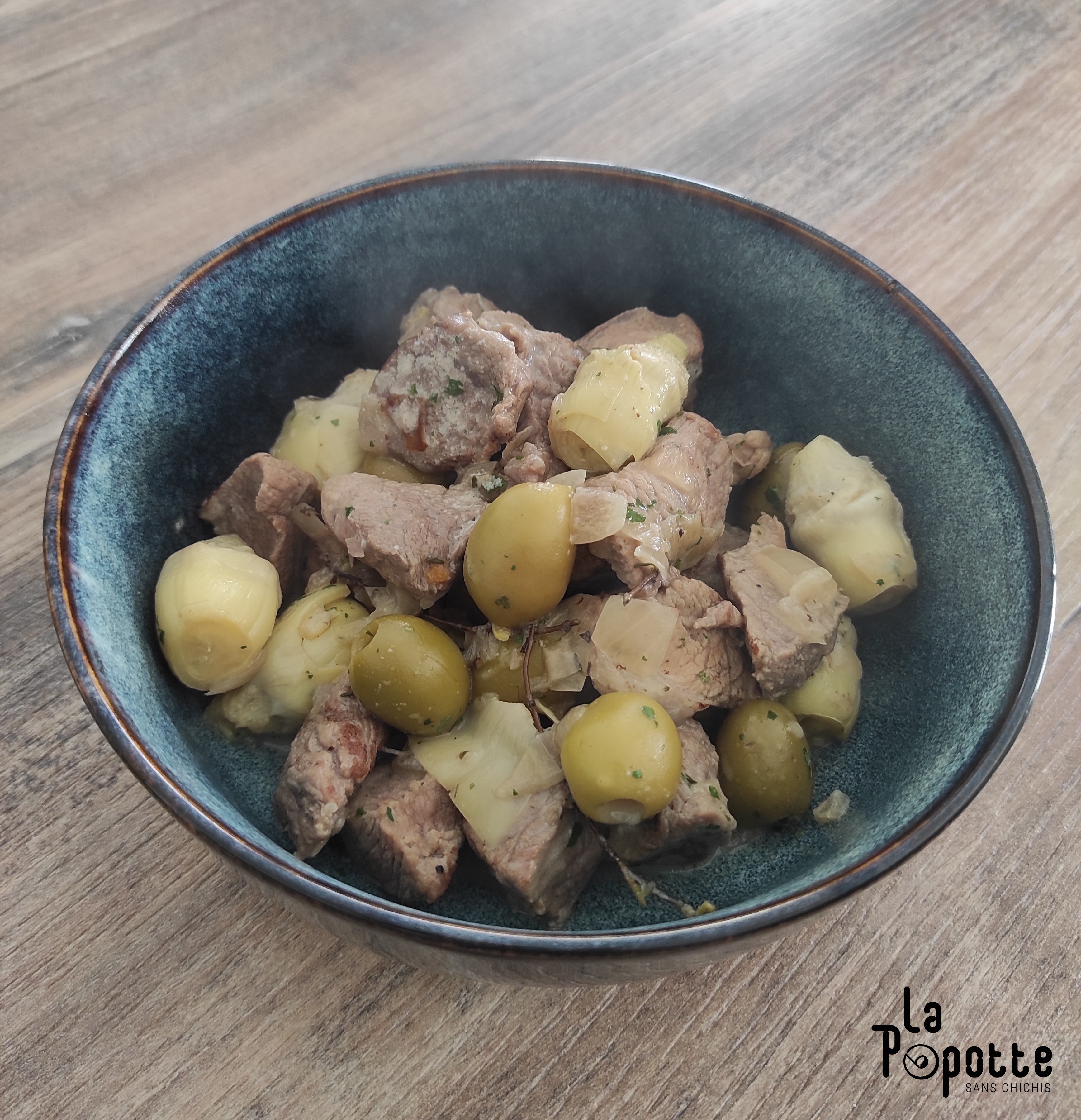 Sauté de porc aux olives et artichaut